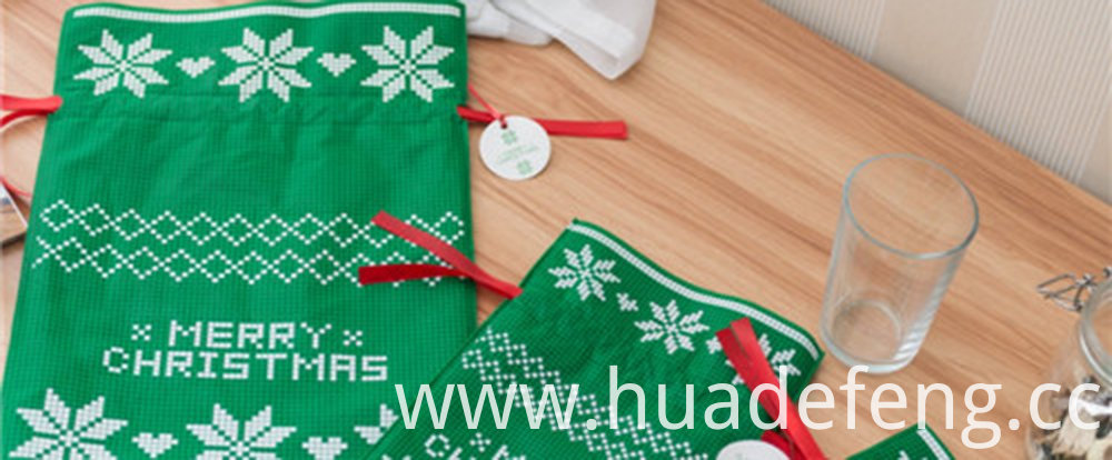 green non woven christmas drawstring gift bag